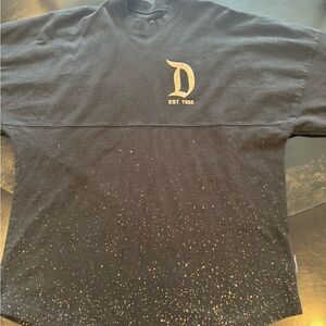 Disney Spirit Jersey  Black Tee with Gold 'D' and Speckle Print